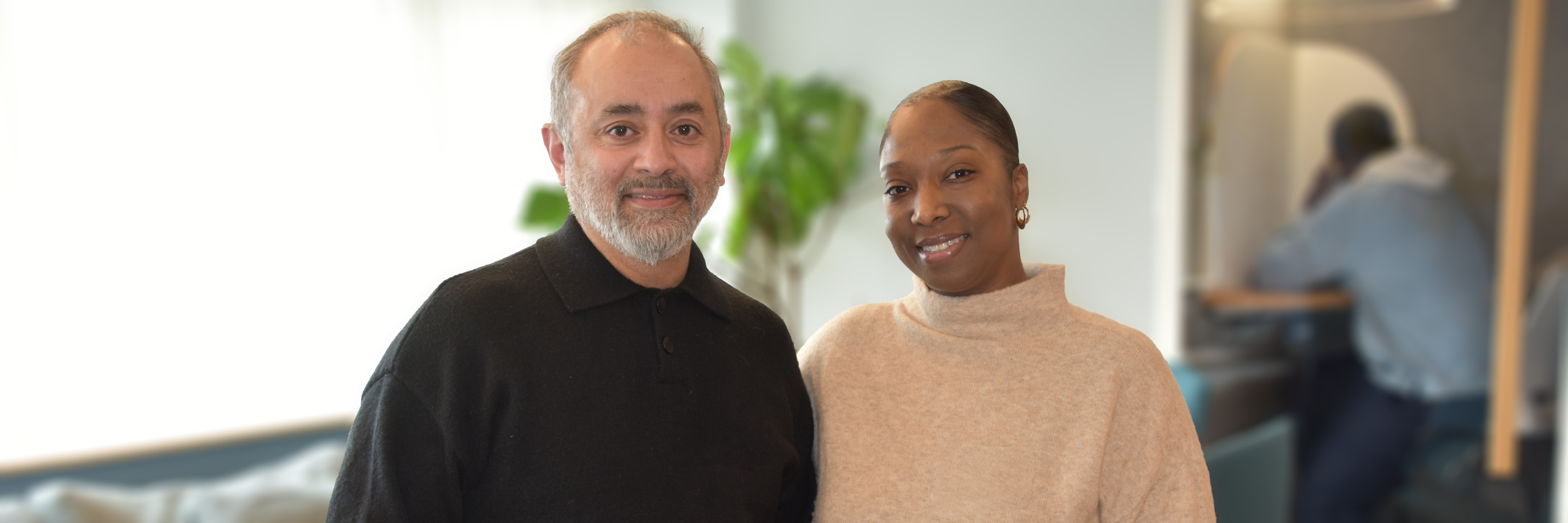 2 Two adult ed instructors smiling. Nadeem + Lorizaine