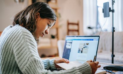 Girl studying at her computer